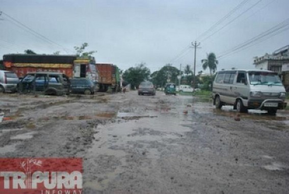 Poor shape of road cripples traffic movement at NH-44 Poor shape of road cripples traffic movement at NH-44